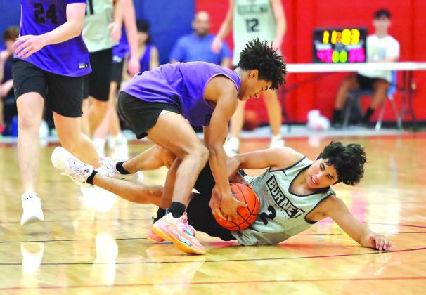 Plenty of excitement in summer league basketball. Pictured above Burnet’s Jacob Atkinson comes diving in to tie-up a loose ball during play versus Marble Falls.