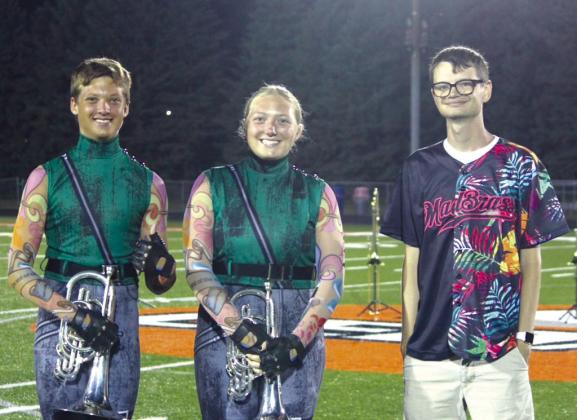 (From left) Burnet High School students Alexander Davis and Emma Collins have joined the renowned Madison Scouts Drum &amp; Bugle Corps to compete this summer with support from (right) Madison Scouts Brass Instructor Jacob Picht, also the Burnet High School assistant band director. Contributed photos/Colleen Davis