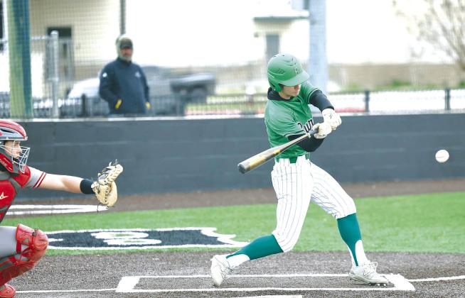 Senior Trenton Park connects for one of his two singles versus Fredericksburg last week. Park finished with two singles, one RBI, and one run scored in the Dawgs 4-0 victory. Photos by Wayne Craig/Clear Memories