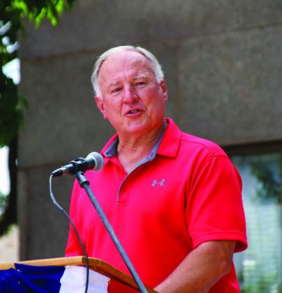 Burnet City Council Member Rev. E. Dale Hill addresses more than 100 attendees May 29 during the Memorial Day ceremony in Burnet at the County Courthouse.