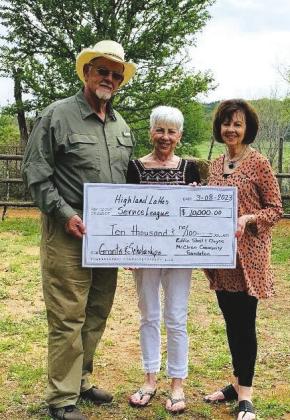 Eddie Shell presenting a $10,000 donation to Highland Lakes Service League's Chuck Wagon Chow Down &amp; Auction Co-Chairs. Pictured from left to right: Eddie Shell, Brenda Eubank and Darlene Hargett.