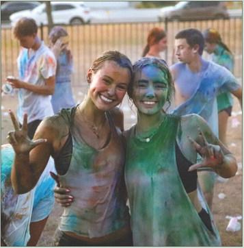 Elle Skelton and Gracie Wiggs displayed their Young Life sign Monday, Sept. 11 during the Burnet Young Life Color War kick off. See more photos on Page 8A.
