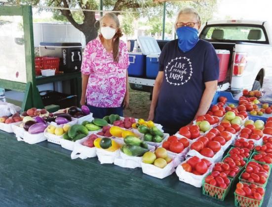 Cowan’s Market in Briggs showcases vegetables and fruit, such as tomatoes, cucumbers, squash, eggplant, onions, peaches and melons. The market is located on Loop 308. Fran Jones/Burnet Bulletin