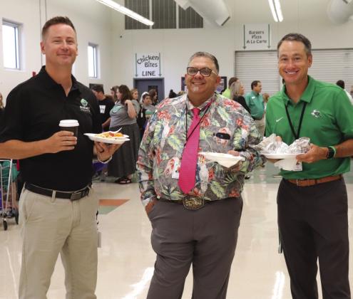 Contributed photo/ BCISD (From left) Burnet High School Assistant Principal Aiden Callahan, Career Technical Educators Brandon Evans and Ben Speer enjoy the Burnet Consolidated Independent School District “Back to School Bash” Aug. 1 at Burnet High School. See more photos on Page 3.