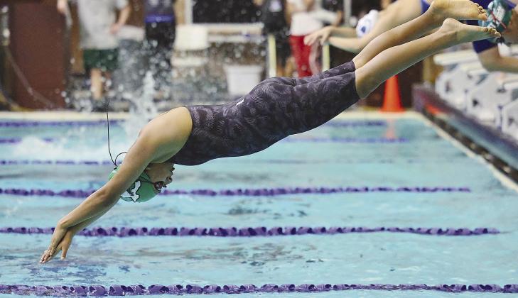 Lady Bulldog Graciela Lara Duran dives in for her portion of the girls relay race in San Antonio on Thursday.