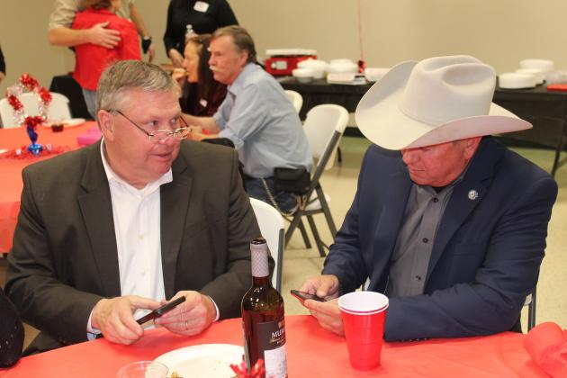 On election night, Burnet County Judge James Oakley and Pct. 4 Commissioner Joe Don Dockery watched as the latest figures rolled in from the GOP election night headquarters at the Reed Building in Burnet on March 1. Raymond V. Whelan/Bulletin 