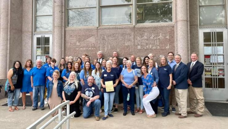 Burnet County Child Welfare Board, HCCAC and CASA announced April as “Child Abuse Awareness Month”with a proclamation issued by the County Commissioners during the April 12 meeting. Representatives paused for an image outside with county officials. Contributed photo