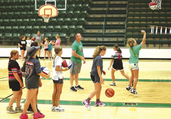 Coach Rick Gates hosted girls basketball camp last week and had a great turnout for the event. The camp welcomed girls grades 3-9 and focused on fundamentals of the game. Photo by Wayne Craig/Clear Memories
