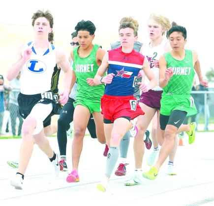 Bulldog distance runners Isaias Zarate and Victor Aviles jockey for position early on in the boys 800. Aviles took gold and Zarate finished fourth.