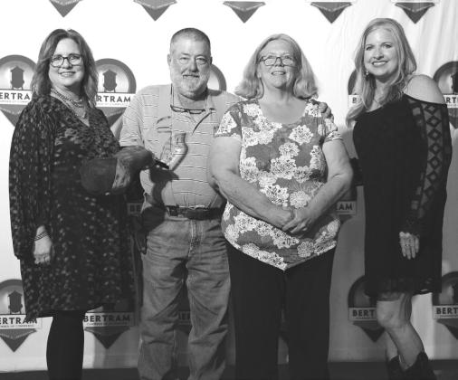 Rancher of the Year was awarded to Brizendine Deer Processing. Pictured are Darrell, Becky and Tara Brizendine, along with Bertram Chamber President Lori Ringstaff (left).
