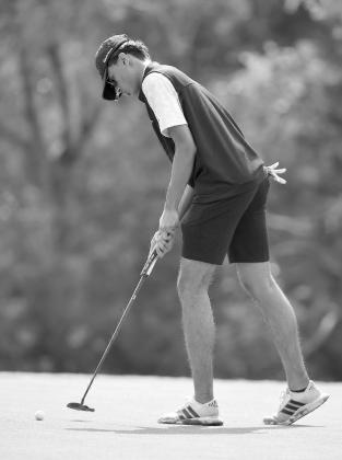 Photos by Wayne Craig/Clear Memories Varsity golfer Vansh Bhakta focuses on a short putt during tournament play last week. Bhakta shot a round of 78 to earn individual gold at the Burnet Invitational.