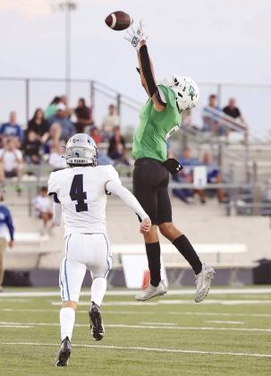 Burnet senior wide receiver, Braden Ellett-Clark climbs the ladder to pull in a pass versus La Vernia. The Dawgs defeated the Bears in their opener, 36-25.