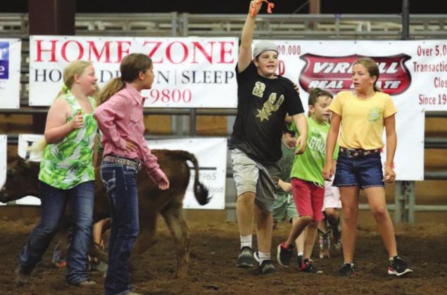 Cooper Hardesty won the calf scramble competition. Photos by Martelle Luedecke/Contributing photographer