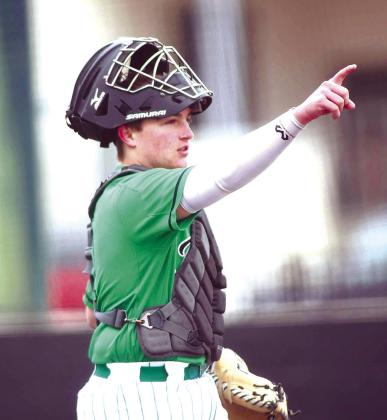 Burnet varsity catcher, Alex Cantrill, calls out to his defense during Llano tournament play on Thursday.