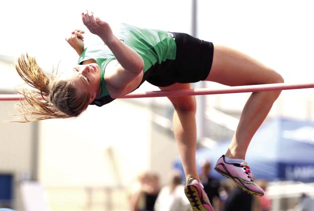 Burnet high jumper Wrigley Mulhollan clears the bar at the Badger Relays. Mulhollan finished with a 4’8 mark.