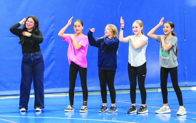 Marguerite Reed, Isla Ramirez, Kennedy Hardison, Adalynn Green and Naomi Baladez danced the Macarena Sunday Feb. 18 during the DIVA Dawgs and Bulldog BROS Family Dance and Dodgeball at the YMCA.