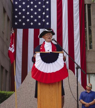 Master of Ceremonies Mike Greco opens the Memorial Day ceremony May 29 in Burnet at the Courthouse Square.
