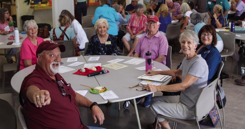 Wade Hibler (left) made the table rounds and shared light-hearted moments, during the Highland Lakes Master Naturalists 20-year anniversary meeting on June 7 in Marble Falls. Sitting, clockwise from left, are Sherry Bixler Class of 2009 (worldrenowned birder); Sue Kersey Class of 2004; Bill Luedecke, Class of 2003; Linda O’Nan, Class of 2003; and Karen McCurley, Class of 2003. Photos by Martelle Luedecke/Luedecke Photography