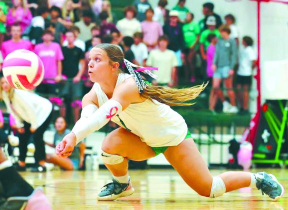Backrow standout, Reagan Shipley, gets low to dig up a hard hit ball during set one of Burnet’s match versus Lampasas. The Lady Dawgs improved the district standing to 6-1 with a sweep over Lampasas.