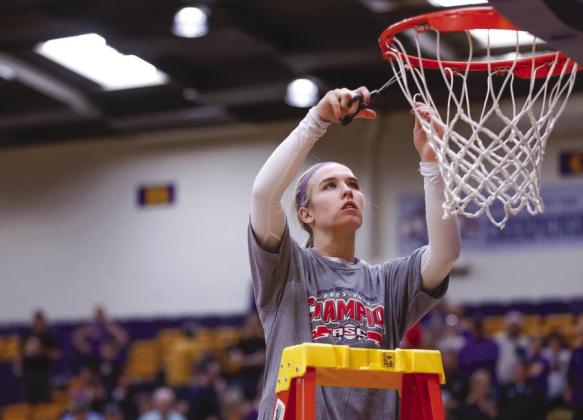 Hardin Simmons University guard Paris Brinkley Kiser recently observed the tradition of cutting the net fastened to the hoop above the floor after she helped the Cowgirls win the American Southwest Conference championship. Contributed photo