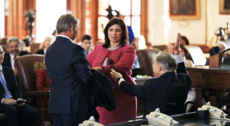 Gov. Greg Abbott swore-in Supreme Court of Texas Justice Rebeca Huddle on Dec. 10 at the State Capitol. Contributed/Office of the Texas Governor