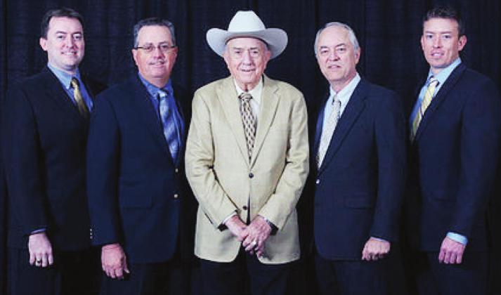John W. Hoover, center, was the founding prinicipal of Hamilton Valley Management Inc.which manages and rents out affordable, reliable housing. Hoover began the company in 1981 and it now has 90 properties in 65 Texas cities. Contributed