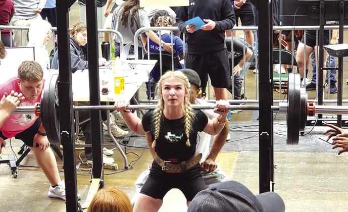 Burnet Lady Bulldog powerlifter Abby Smith pushed up a new personal best squat of 295 pounds at Friday’s state meet in Frisco. Smith finished seventh overall with a 745 pound total. Contributed photo