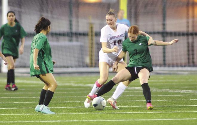 On Friday Wimberley tried every tactic they could think of, including a few illegal ones like the one pictured above, to slow the attack of Amelia Griffin. It didn’t work and Griffin scored the hat trick with three goals in the contest.