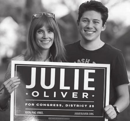 Democratic Congressional candidate Julie Oliver, left, and her campaign’s digital and relational organizer Jason Taper. Contributed