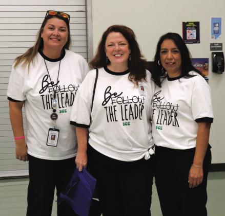 Burnet Shady Grove Elementary School administrators (From left) Skeeter DeLeon, Laurie Murchison and Edith Hernandez enjoy the Burnet Consolidated Independent School District “Back to School Bash” Aug. 1 at Burnet High School.