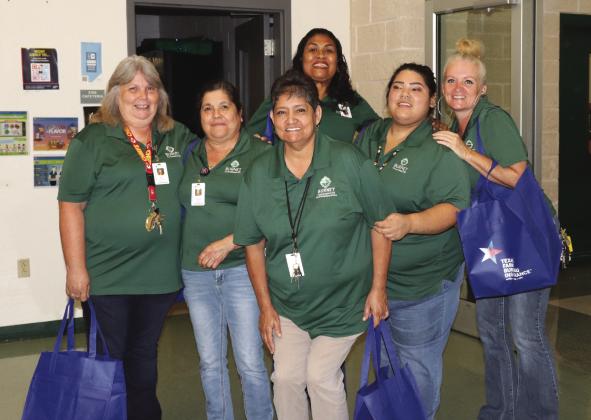 Burnet Consolidated Independent School District Facilities Operations personnel (from left) Sherrie Hair, Esperanza Arrendo, Efigenia Ortega, Rachel Anthony, Emily Escamilla, Alisha Wallace participated during the annual BCISD “Back to School Bash” celebrated by hundreds of administrators, educators, parents and students Aug. 1 at the Burnet High School.