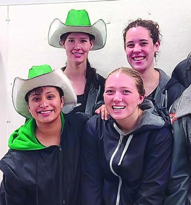 Above, Burnet’s boys 200 free relay team of Jack Milliorn, Grant Roberts, Levi Kleen, and Stellan Zollitsch earned a state ticket with their efforts at last weekend’s regional meet. Right, Lady Bulldog swimmers (back row) Caroline Lunsford and Brynlie Tappe, and (front row) Graciela Lara Duran and Emma Collins, combined swims to earn two state tickets in their relay events at regionals.