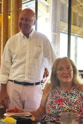 Perry Thomas took some time out to greet Brenda Miles during the Wine Wednesday event hosted by Burnet County Republican Women in Marble Falls.