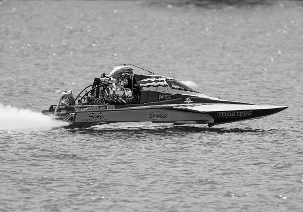 Burnet’s Jay Hudgins of Bulldog Bodywerks clocked 4.08 ET at 120.49 mph on a shortened track due to high winds Saturday, June 10 at the 2023 LakeFest Drag Boat Races on Lake Marble Falls. Photo courtesy Christopher Miles Photography
