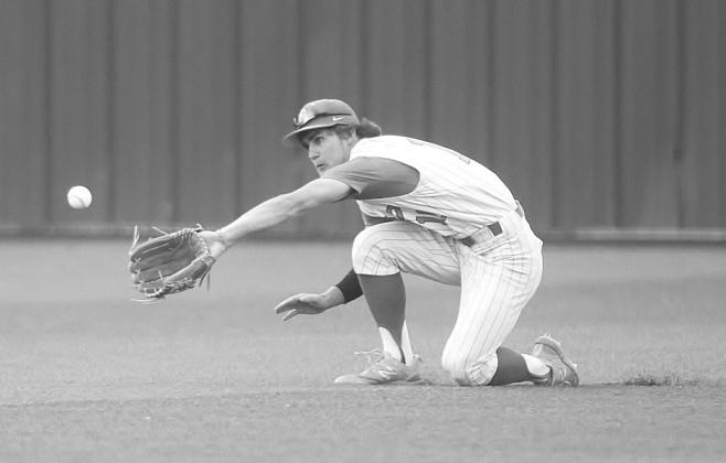 Burnet senior centerfielder, Trenton Park, charges forward to make a clutch catch for a third out in Burnet’s district contest versus Gateway.
