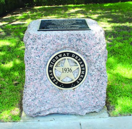 One finepolished plaque appears atop the Texas Highway Department stone market in Burnet at the County Courthouse.