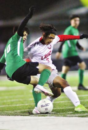Burnet varsity soccer player Luis Chavez (10) battles a Lake Belton Bronco winning control of the ball with some fancy footwork. Chavez scored one of Burnet’s two goals in the Bulldogs district win, 2-1. Friday’s games versus Lampasas were postponed due to weather. The Dawgs are hoping to get back to the fields later this week. Wayne Craig/Clear Memories